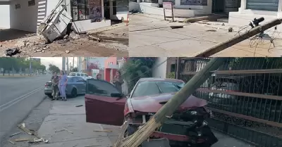 Choca con postes de Telmex y derriba cableado