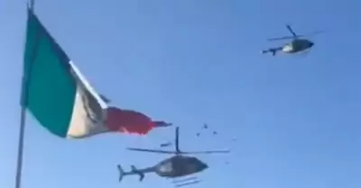 Helicptero roza y rompe con sus hlices Bandera monumental en el Campo Militar