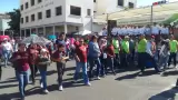 Participantes en desfile del Día del Trabajo