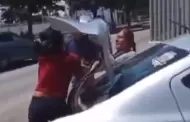 VIDEO Funerarias se pelean por "cliente" afuera de Semefo