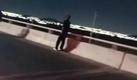 Joven intentaba arrojarse de un puente