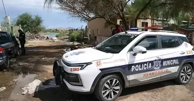 Hallan cuerpo flotando en laguna de aguas negras