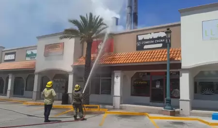 Incendio en negocio de venta de pollo asado