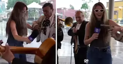 Reportera recibe un arma de un mariachi